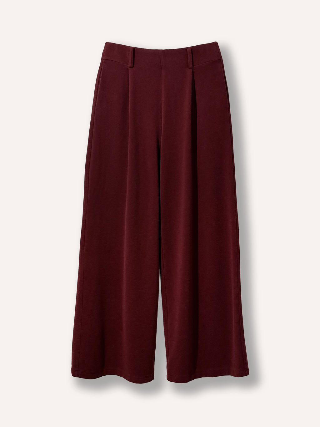 Pantalon beige large à plis pour un confort optimal. Idéal pour un vêtement moderne, facile à porter, chic et polyvalent. Tissu doux et extensible.